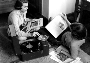 women reading and listening to music